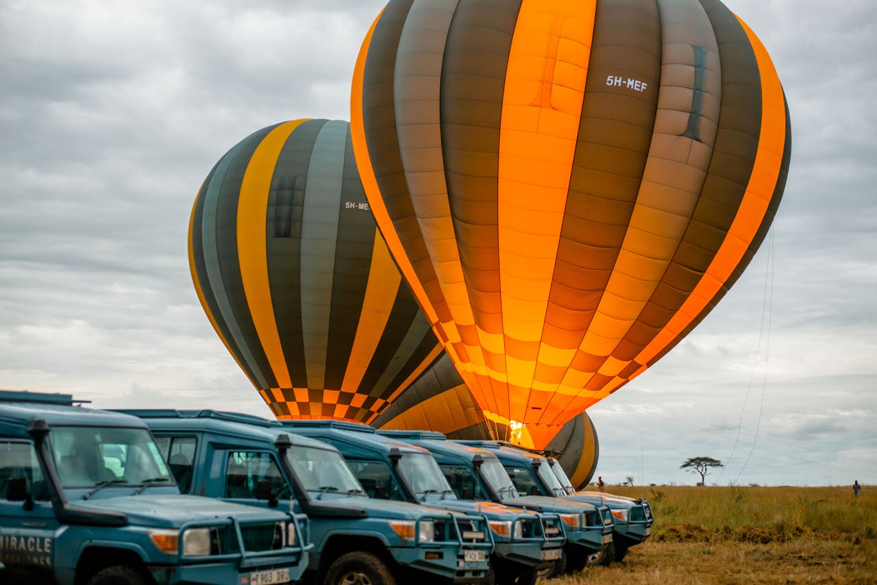 featured-portfolio-04 Captivating dawn scene of hot air balloons readying for launch during a safari in Tarangire National Park, Tanzania.